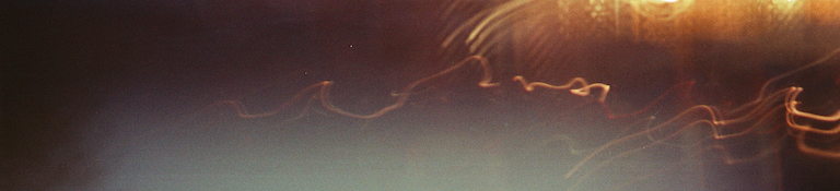 lights of the CNH, from a puddle, blurred